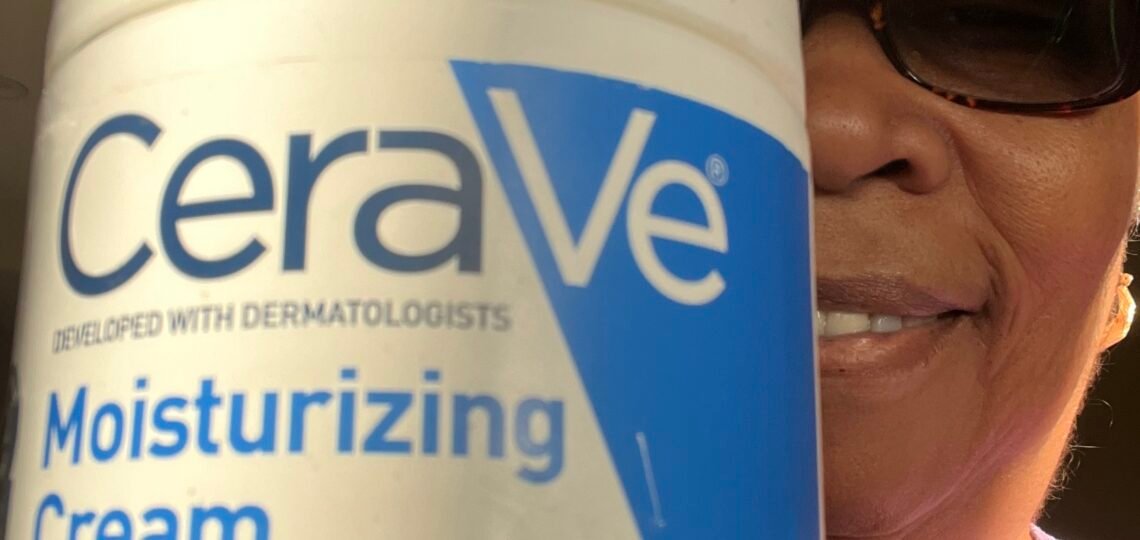 I am holding a jar of CeraVe Moisturiing Cream